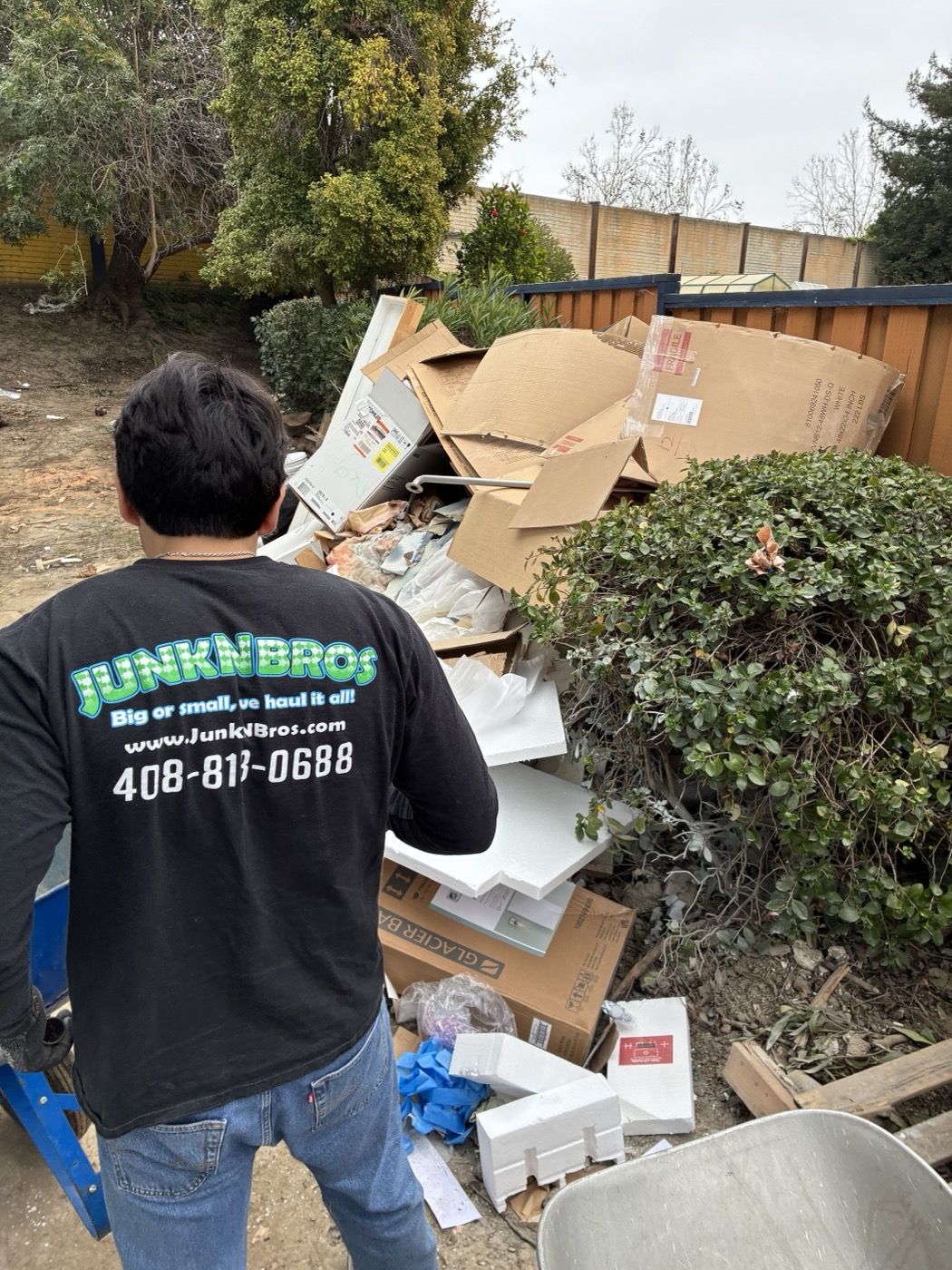 Worker sorting debris